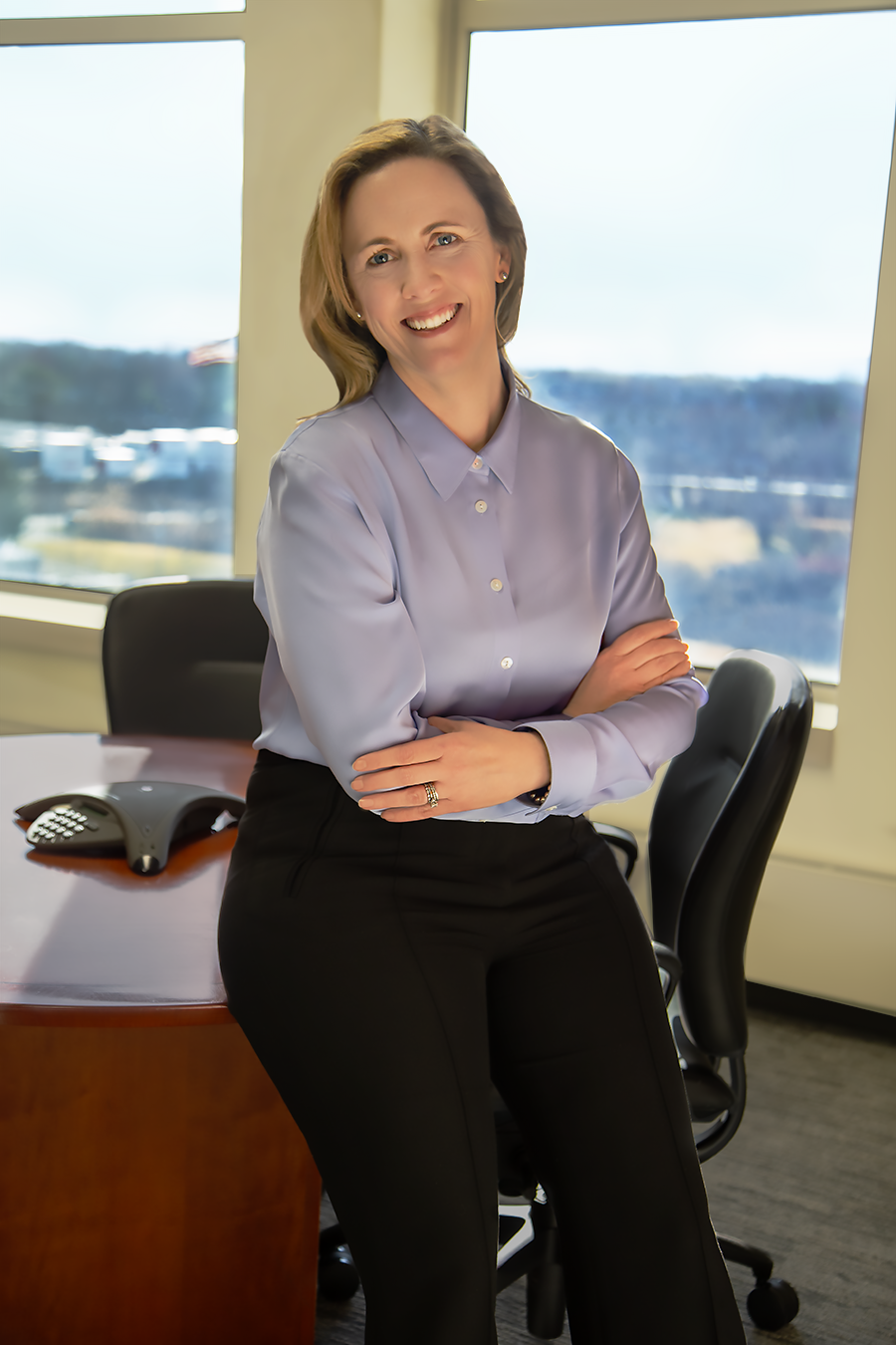 Emilie Nelson, Executive Vice President & COO